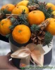 Шляпная коробка с мандаринами